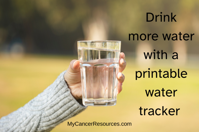 woman holding glass of water next to text saying drink more water with a printable water drinking chart